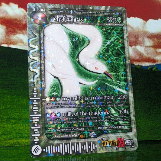 Trading card with a green dragon design on a colorful background